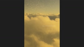 Experience a breathtaking aerial journey above the clouds during sunset & Nature’s beauty from the sky.