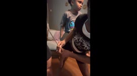 Super Stylist Balances Baby While Braiding at Top Speed