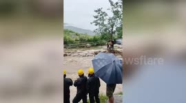 India: Cloudburst triggers flood fury trapping owner with pet dog in raging waters, dramatic zip-line rescue follows