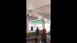 Young graduate falls on stairs after ceremony in Paciran, Indonesia