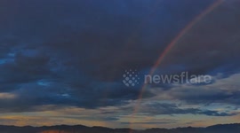 Double rainbow appears in evening sky in Magna, Utah, USA