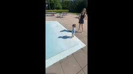 Baby's First Dip In the Pool