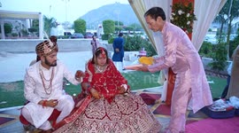 Pigeon lands of bride's head during wedding in India