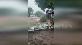 US: Dramatic Airlift Rescues People From Raging Texas Floodwaters As Helicopter Descends