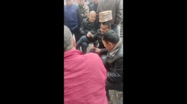 Loser with Bricks on Head