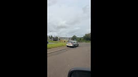 Hilarious moment as man tries to conquer a colossal bike sculpture