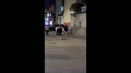 Girl Slips Off Boy’s Back