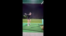 Beginner golfer tees up shot only to whack the ground