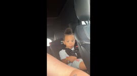Toddler rocks out and does the headband to some Metallica music
