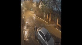 Father and Daughter Both Slip in the Rain