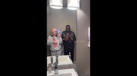 Couple dresses up as P diddy and a bottle of baby oil for Halloween