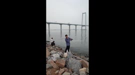 Man Breaks Fishing Rod