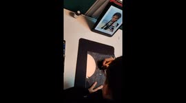 Man Carves on Acrylic Board