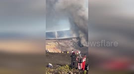 Tornado forms on volcano as lava fountains form just yards away
