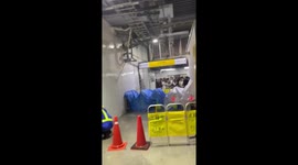 Water leaks from ceiling at Shibuya train station as heavy rain hits Japan