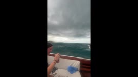 Terrified tourists battered by storms while taking boat from Thai island