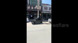 Elderly man in China drives small electric vehicle inspired by Tesla's Cybertruck