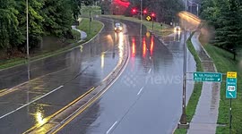Amazon truck skids on wet road and crashes down embankment
