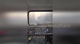 Tractors clear aftermath of Nenana Ridge Complex Fire in Alaska