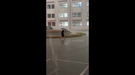 Student regrets walking through storm when umbrella blows away