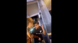 Caught on camera - Man reaches for woman’s hand before stranger steps in