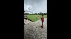 Bouncing ball launches drink into funnel in Rose Hill, Kansas, USA