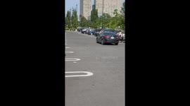 Furious driver tries to run over pedestrian but ends up hitting parked car in heated argument