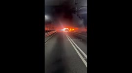 Car fire blocks all lanes in Lincoln Tunnel during rush hour in New Jersey, USA
