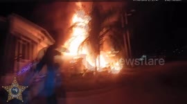 US: Deputies Rush Into Burning Mobile Home To Save Trapped Elderly Couple And Dog