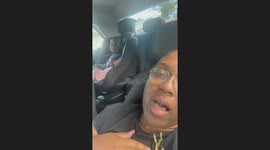 Toddler bursts into laughter as mom entertains her while waiting in the car