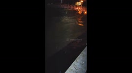 Raging floodwaters sweep vehicles amid rainfall in China