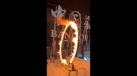 A Man Jumps Through the Rings of Fire