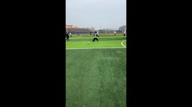 The Girl Trips Over Football