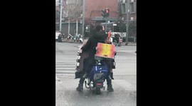 The Boy Shows His Certificate to Passers-by