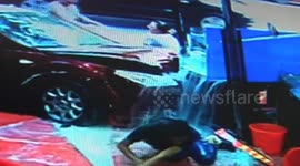 Car smashes barbecue shop injuring three