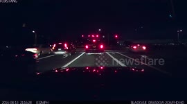 Distracted cop blows a red light