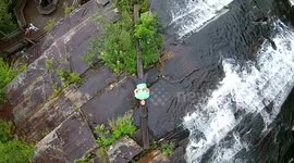 Man takes selfie on a waterfall with a drone