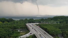Newsflare Edit - Incredible HD footage of a tornado in Singapore