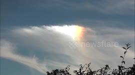 Beautiful Sun Dog and rainbow footage