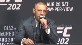 Conor McGregor speaks to the press after beating Nate Diaz