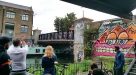 West Ham fans jump off bridge into canal after beating Bournemouth