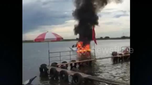 Helicopter crashes into river