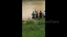 Man taking a nap in river is mistaken for dead body