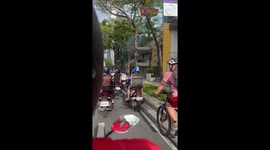 Motorcycle rider fits chair to the back for passenger
