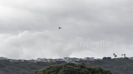 huge brush fire in hawaii on Oahu | 2 helicopters trying to extinguish fire | multiple fire trucks sighted in area