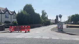 Road turns to molten tarmac and sticks to tyres and flip flops in heatwave