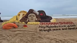 Sand Artist created beautiful a 6-foot sand sculpture Shiva Linga on Puri beach, Orisha