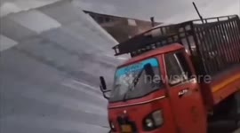 Roofs torn away by monsoon season storm in India