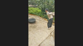 Girl Balances on Basin Rim