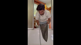 Brother pranks sister with water-filled bag drop in Istanbul, Turkey